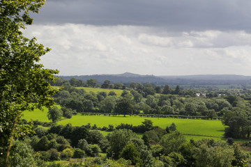 Obraz premium Glastonbury Tor under stormy sky