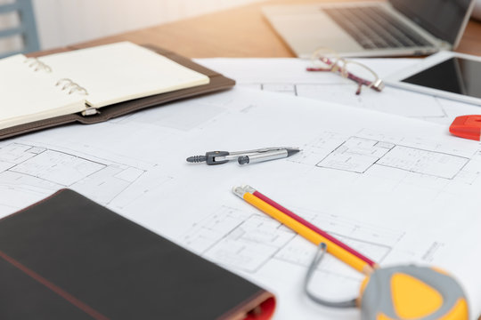 Engineer and Architect concept, Engineer Architects office team working with blueprints - Powered by Adobe