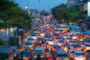 Blurred car traffic background at rush hour in Hanoi street, Vietnam