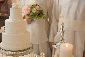 White wedding cake, close up of cake and blur background.