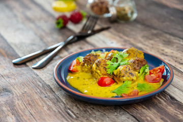 6 vegetable balls and quinoa , curry coconut cream