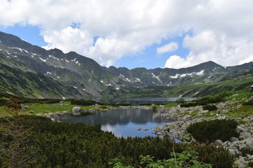 Naklejka na ściany i meble Breathtaking landscape - a lake in the tatra mountains