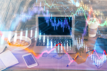 Multi exposure of forex graph and work space with computer. Concept of international online trading.