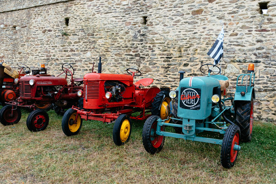 Old Eicher Diesel tractor in traditional festival in Brittany