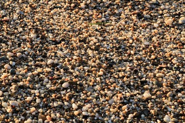 Rock textures, boulders and waves on the shore in Cartagena, Spain