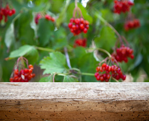 .image of wooden table in front of abstract blurred background of