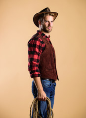 western america. cowboy with lasso rope. Western. Vintage style man. Wild West retro cowboy. man...