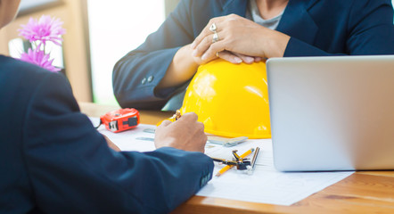 The businessmen, property owners and architects jointly designed his construction project.