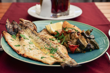 Roasted dorada fish with vegetables