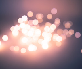 Beautiful blurred bokeh, a lot of bright artistically blurred circles. Christmas background.