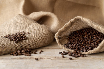 Coffee beans in burlap sack front view