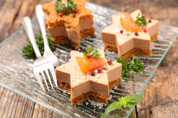 festive canape with foie gras and salmon