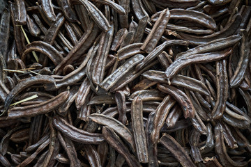 Pile of carob beans