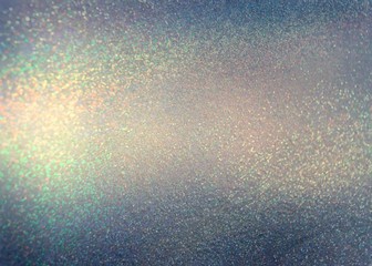 Old yellow blue green shimmer texture. Lot of small sparkles pattern. Ancient festive glitter background.