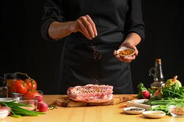 Preparation and cooking of pork ribs by a chef for grill