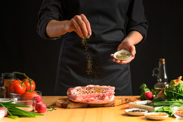 Preparation and cooking of pork ribs by a chef for grill