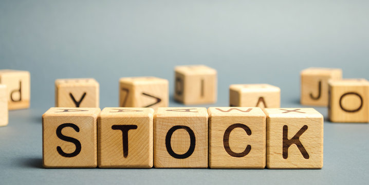 Wooden Blocks With The Word Stock. Trading On The Stock Exchange. Investment Portfolio. Capital Gains. Common And Preferred Stocks. Market Trading And Pricing. Share Price Determination.