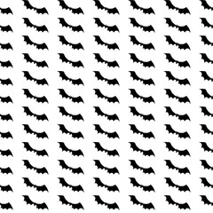 Halloween pattern. Black silhouettes of bats on a white background. Seamless vector backdrop