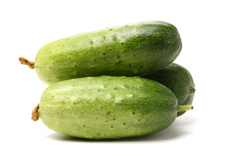 Green cucumber on the white background
