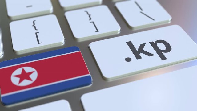Domain .kp and flag of North Korea on the buttons on the computer keyboard. National internet related 3D animation