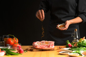 Preparation and cooking of pork ribs by a chef for grill