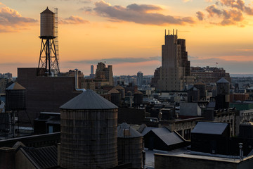 Summer Sunset light on Chelsea rooftops and water towers, Manhattan, New York City