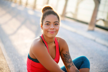 Dark-eyed beautiful woman feeling amazing after yoga