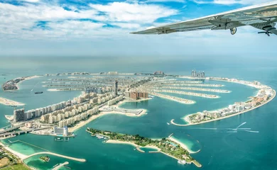 Rolgordijnen Aerial view of Dubai Palm Jumeirah island, United Arab Emirates © Delphotostock