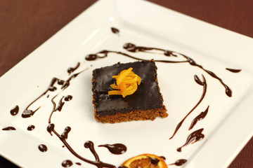 Chocolate brownie with candied orange zest