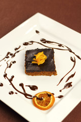 Chocolate brownie with candied orange zest