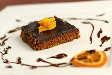 Chocolate brownie with candied orange zest