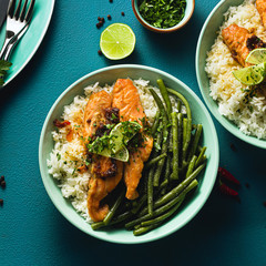 fresh salmon fried with ginger and garlic in coconut milk, with basmati rice and green beans in...