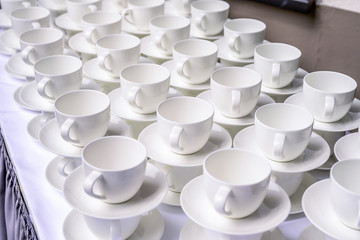 Abstract blurred many stacked rows of coffee tea cups