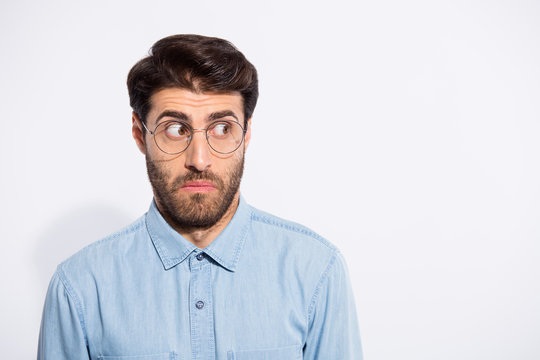 Photo Of Amazing Indian Guy Looking Side Empty Space Feel Guilty For Awful Situation Wear Specs Casual Denim Shirt Isolated White Color Background