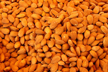 Macro background texture of unpeeled almonds