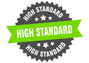 high standard sign. high standard green-black circular band label