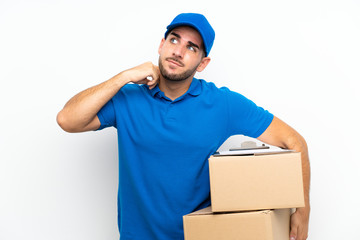Delivery man over isolated white background thinking an idea