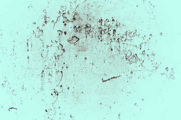 Vintage cyan background. Rough painted wall of hazel color. Imperfect plane of brown colored. Uneven old decorative toned backdrop of blue tint. Texture of azure hue. Ornamental stony surface.