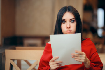 Surprised Woman Reading Legal Documents in a Restaurant