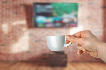 Cup of coffee and watching tv