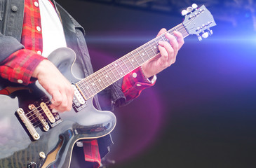 Obraz na płótnie Canvas Rock concert. Electric guitar in action.