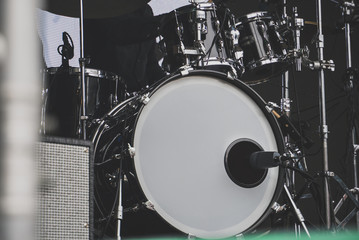 Rock concert. Drummer in action on stage.