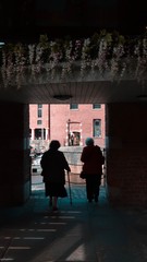 Old women walking together