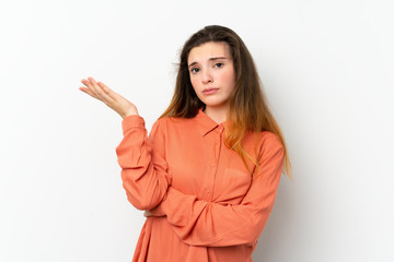 Young brunette girl over isolated white background unhappy for not understand something