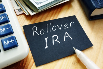 Business photo shows hand written text Rollover IRA