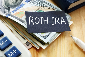 Conceptual hand written text showing ROTH IRA