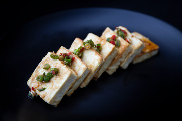 Fried Tofu with Soy Sauce and chillies which is called Dubu Jorim in Korea