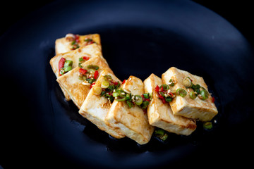 Fried Tofu with Soy Sauce and chillies which is called Dubu Jorim in Korea
