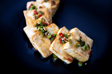 Fried Tofu with Soy Sauce and chillies which is called Dubu Jorim in Korea