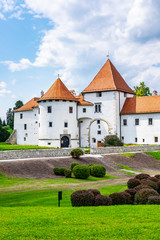 Fototapeta na wymiar City park and old castle in Varazdin, Croatia, sunny summer day